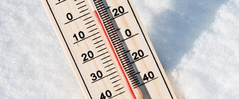 Thermometer in snow with cold temperature reading | CNA Canada
