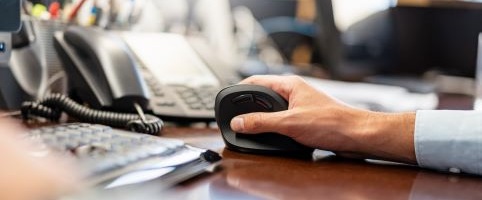 Person Using Computer Mouse