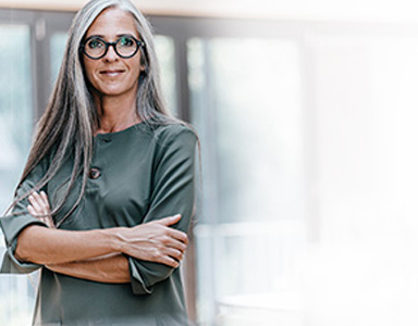 Woman smiling ahead | CNA Insurance
