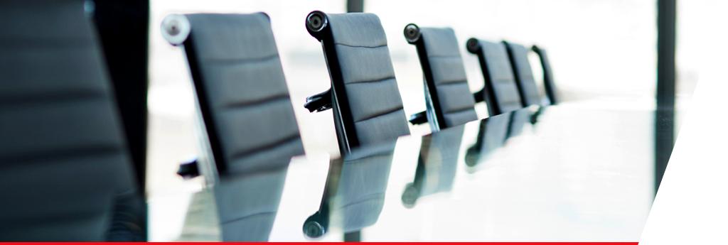 Empty boardroom with chairs | CNA Insurance