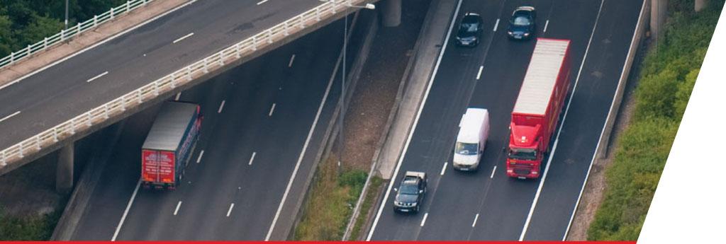 Various types of vehicles pictured at a crossroads | CNA Insurance