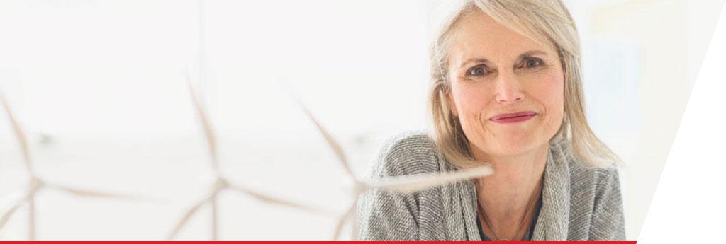 Smiling businesswoman in a meeting with businessman | CNA Insurance