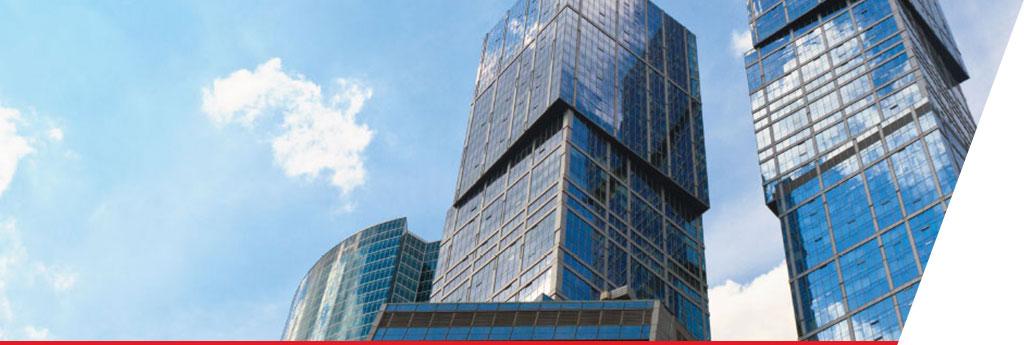 Angled view of city skyscrapers | CNA Insurance 