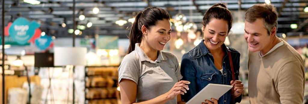 Furniture store with people looking over products | CNA Canada