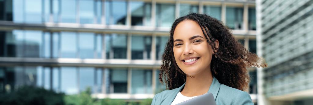 Woman standing outside an office building