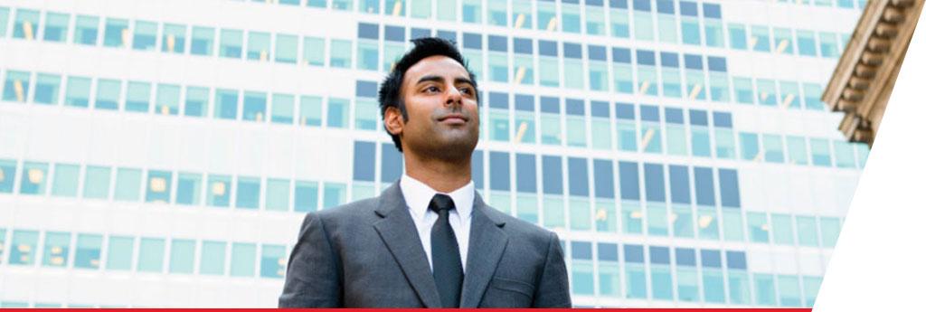 Man standing in front of an office building