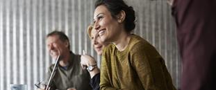 Cheerful woman in a meeting