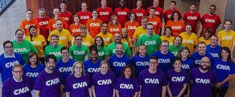 Group of people together in rainbow colors